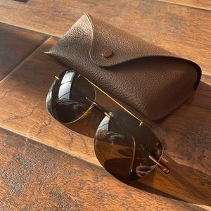 RAY-BAN polarized frameless brown and gold sunglasses
